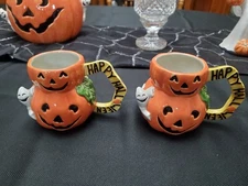 FITZ AND FLOYD Omnibus Halloween Pumpkin and Ghost Mug Set of Two.