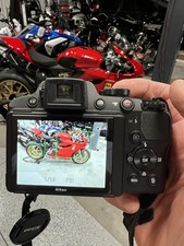 Nikon COOLPIX P510 42X Zoom 16.1 MP Digital Camera w/ Case, accessories & tripod