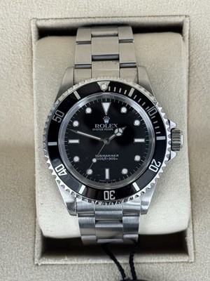 Rolex Submariner 14060 Silver Oyster Bracelet with Black Bezel Watch Only