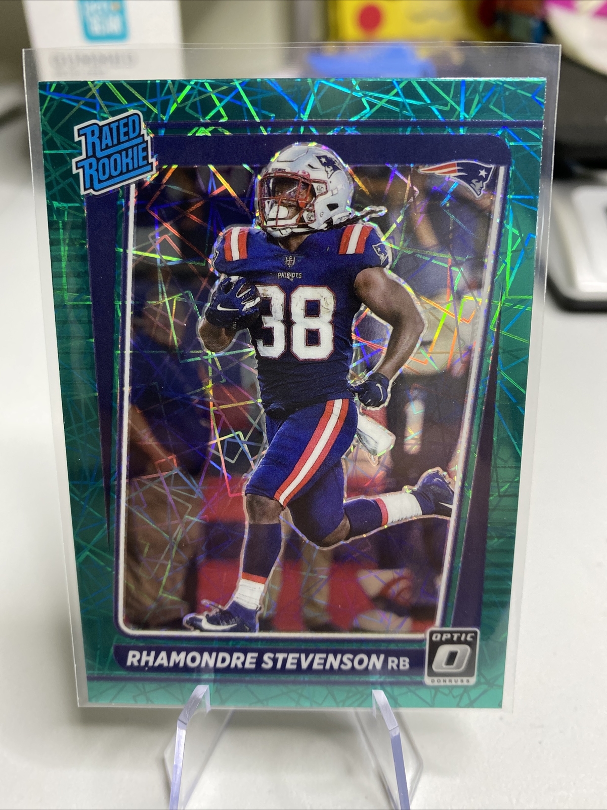 2021 Donruss Optic Rhamondre Stevenson Green Velocity Prizm RC #237 Patriots