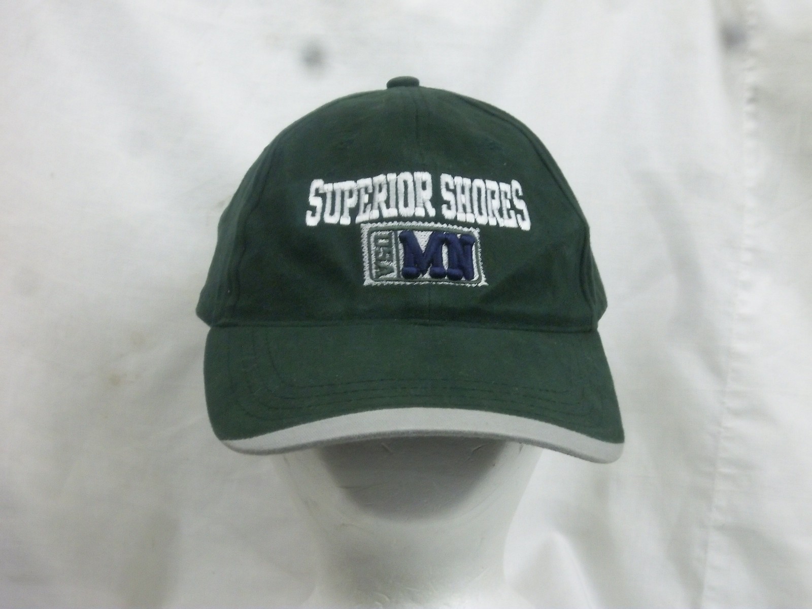 Superior Shores retro green trucker hat with curved brim