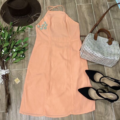 coral dress and black shoes coral dress