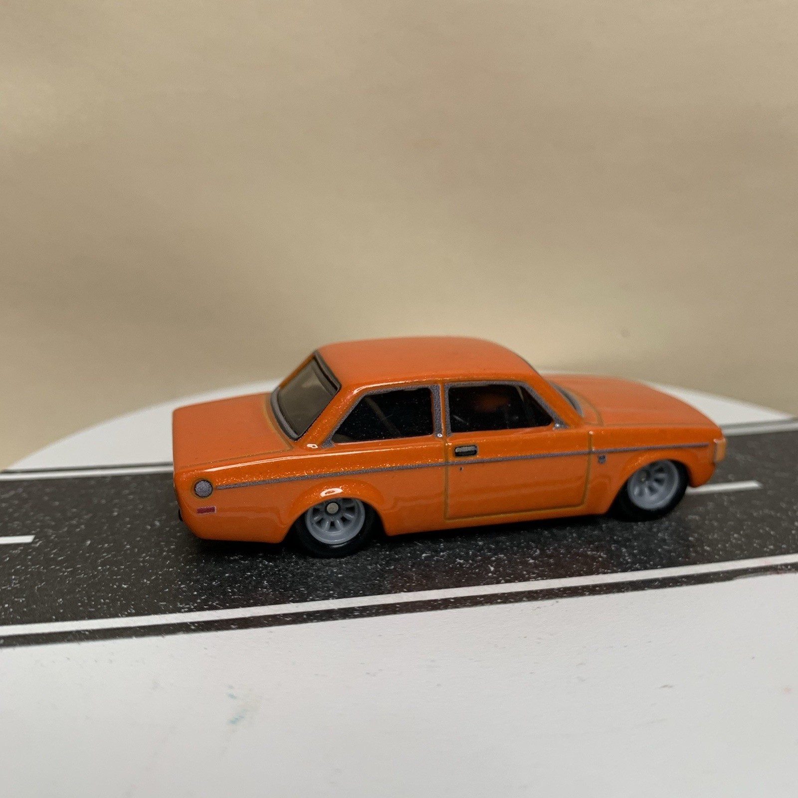2023 Hot Wheels Premium Canyon Warriors ‘73 Volvo 142 GL Sedan Orange 1:64 NM