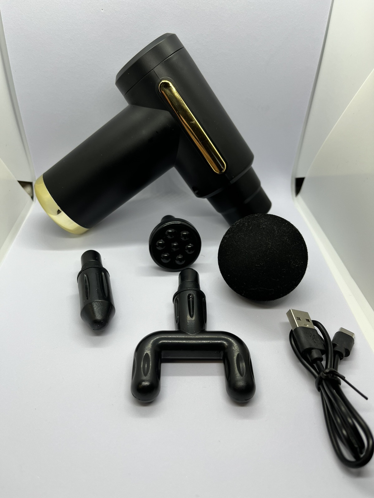 Pistola de Masaje de 4 Cabezales Vibración Relajación Muscular