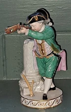 Fine Antique Meissen Porcelain Figurine 'Boy Firing Crossbow' by Micheal Acier