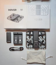 Hover Air X1 Drone W Charger, Cable, Carrying Case And 2 Batteries.