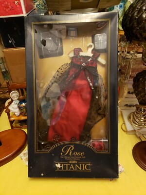 rose titanic red dress I was OBSESSED with the red dress, with the entire Titanic movie when it  came out, I was about 10 years old at the time. I was given a Rose Barbie  doll