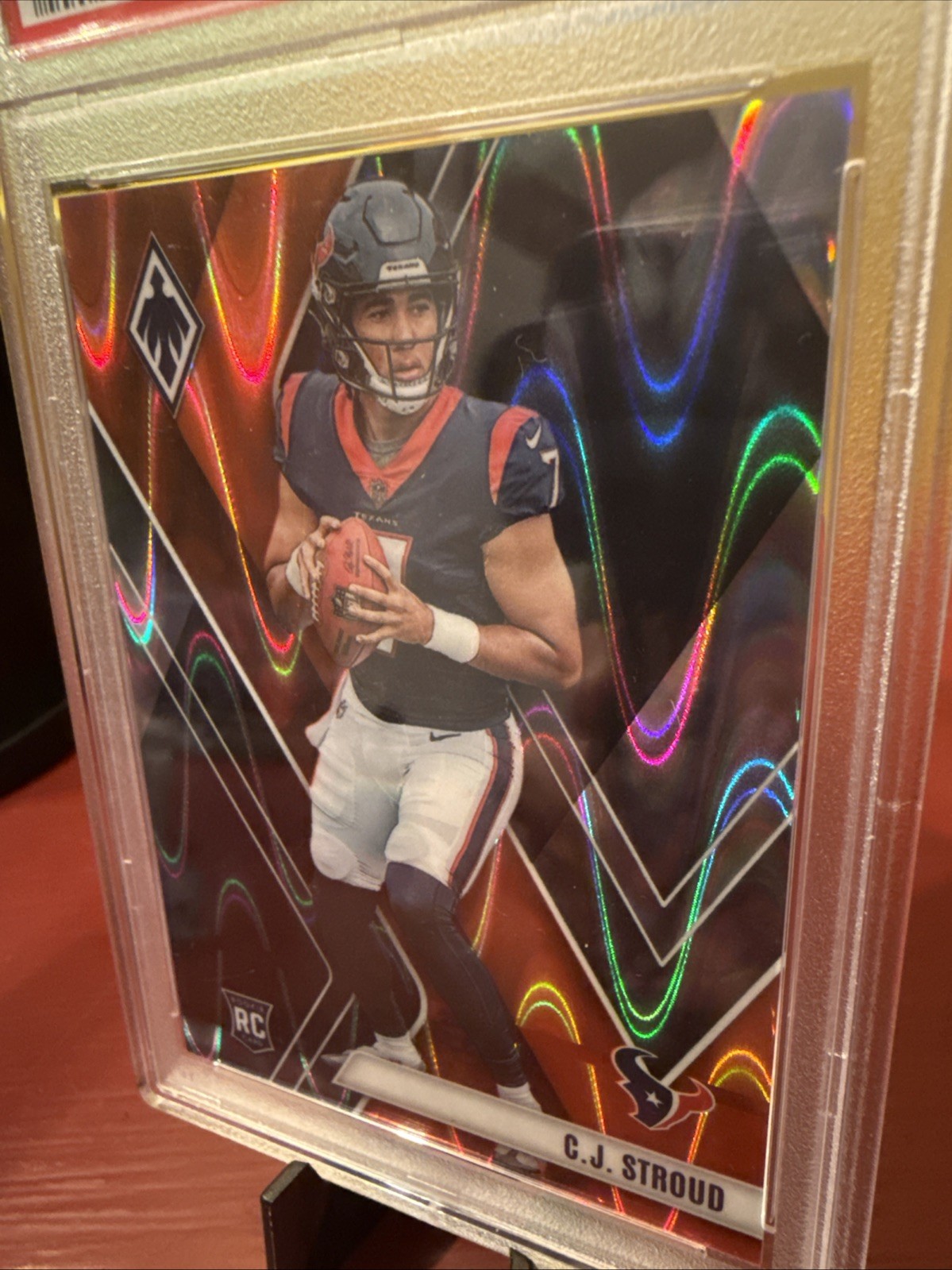 2023 Panini Phoenix Rookies C.J. Stroud #102 Orange Seismic /99 (RC) PSA 8 NM-MT view 4