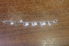 7 STERLING SILVER BRACELET W SHOE-PURSE CHARM...