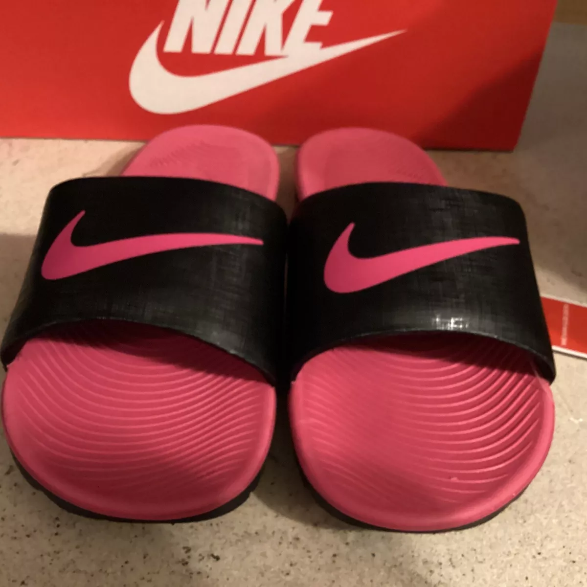 Girls black nike best sale slides