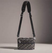 Safari bag with carrying strap