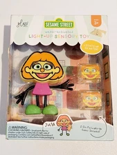 NEW GLO PALS WATER ACTIVATED LIGHT-UP SENSORY TOY-SESAME STREET AND AUTISM-JULIA