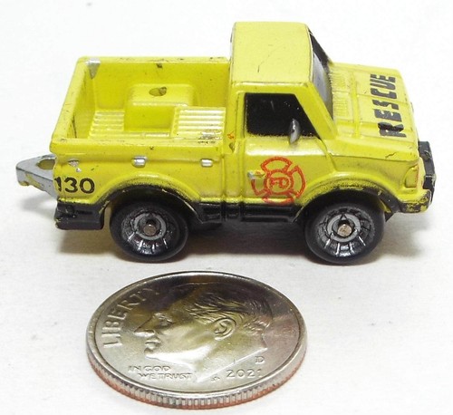 Small Micro Machine Datsun Pickup truck in Yellow marked Rescue (Worn) - Picture 2 of 3