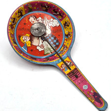 VINTAGE TIN LITHO MASQUERADE PARTY NOISE MAKER PADDLE - US METAL TOY MFG. CO.