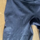 Women’s RARE Lululemon Black On Black Logo Leggings Size 2 length 23 Inch — photo 2
