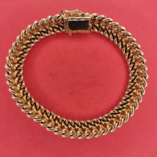 Gourmette maille américaine vintage GL plaquée or jaune 18k avec poinçon.