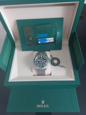 Rolex Submariner GETRAGEN mit leichten Gebrauchsspuren aus 2025 grün