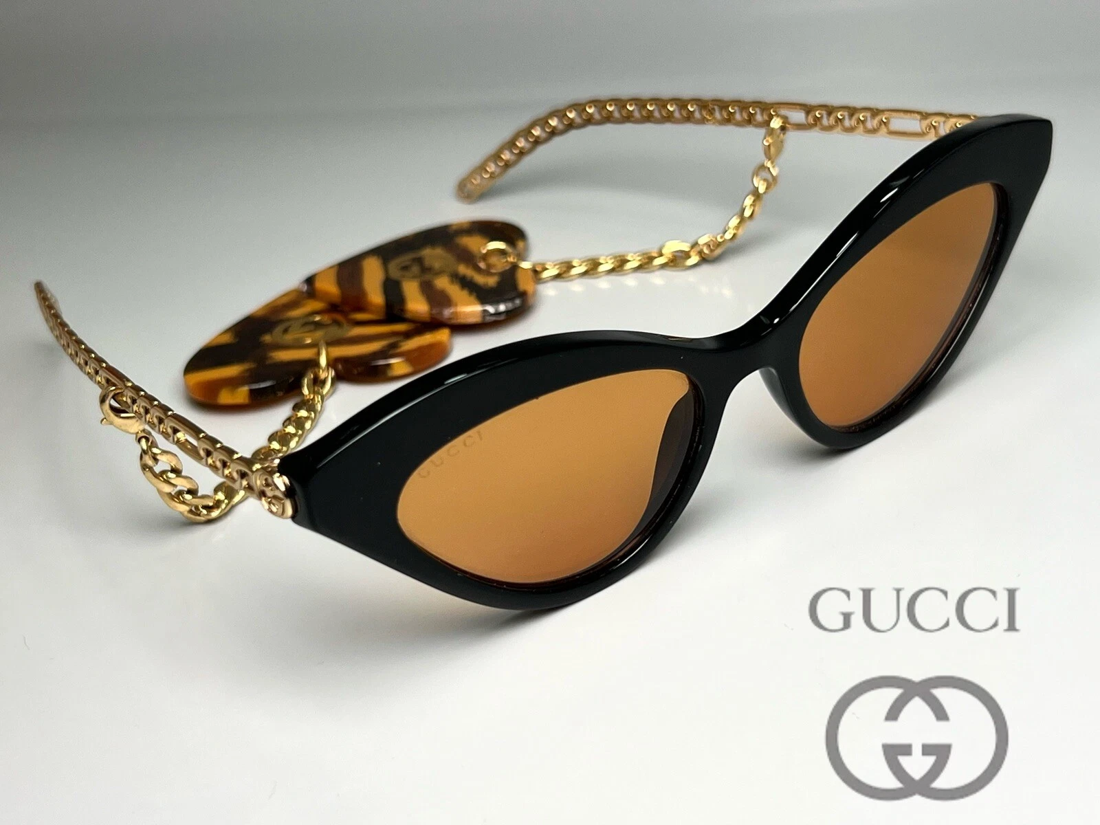 Nuovi occhiali da sole Gucci GG0978S occhio di gatto metallo oro 52 140 con catena oro Italia
