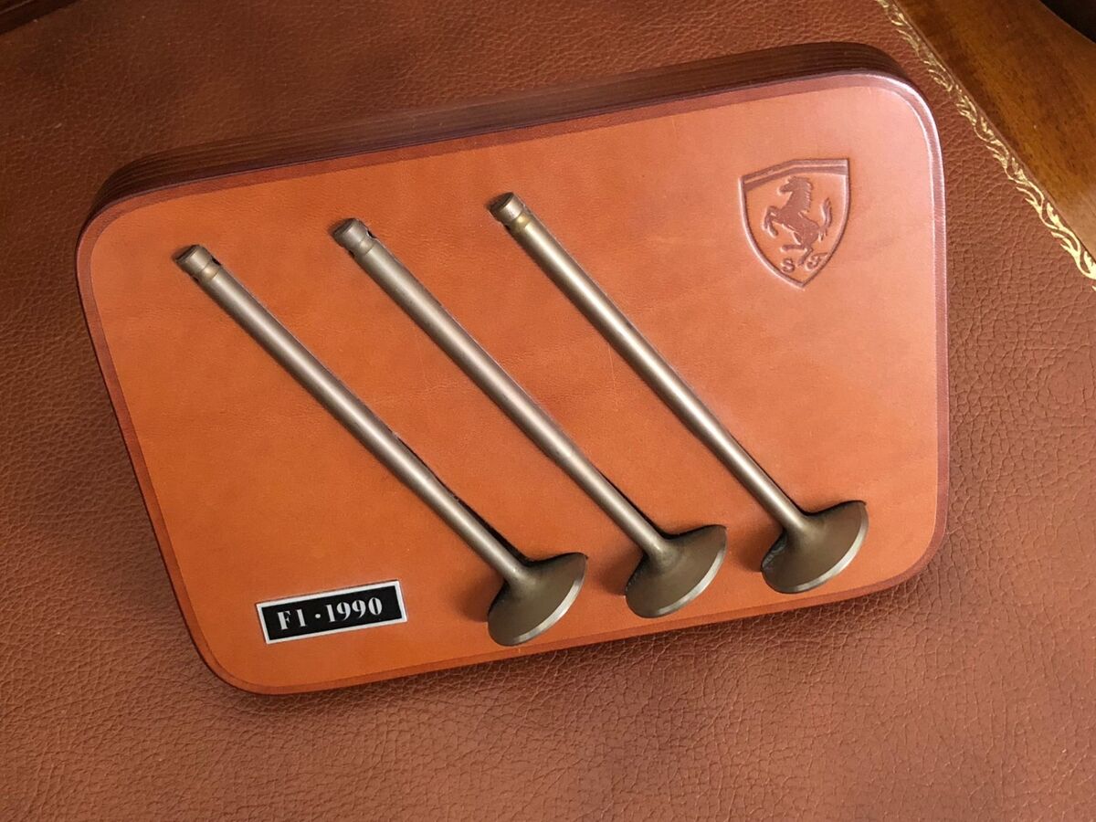 Genuine Ferrari 641/2 F1 Engine Valves on Schedoni Layered Genuine Ferrari 641/2 F1 Engine Valves on Schedoni Layered