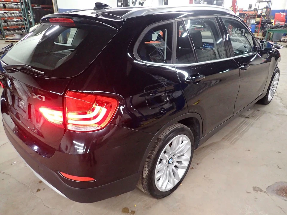 13 14 15 BMW X1: muelle helicoidal trasero derecho; AWD Foto 2 de 2