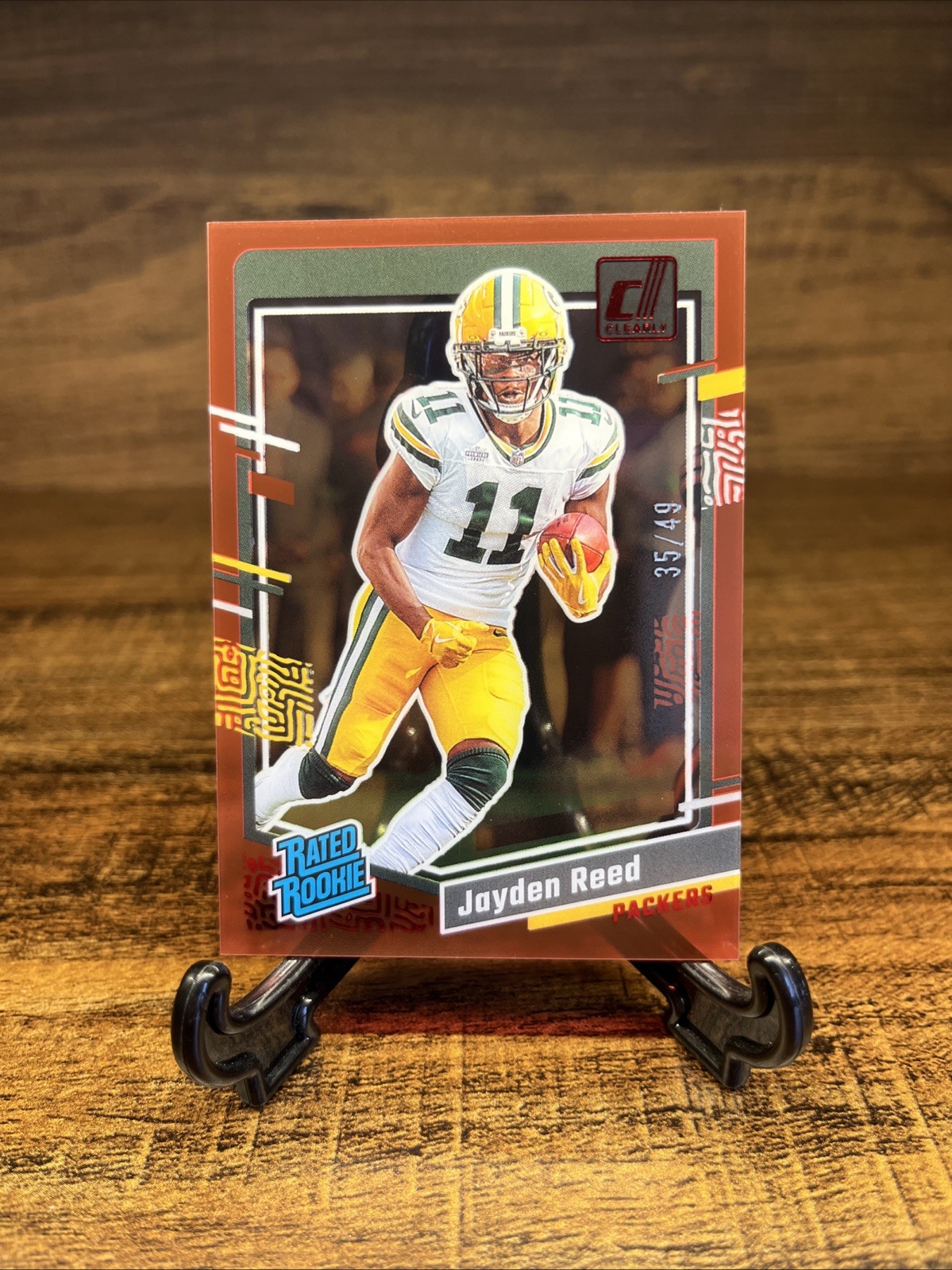 2023 Panini Clearly Donruss - Rated Rookie Jayden Reed #68 Red /49 (RC)