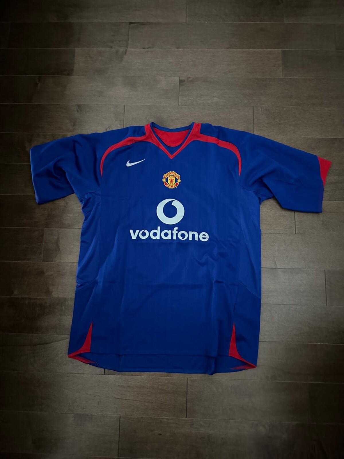 Manchester united blue sales vodafone jersey Manchester united blue sales vodafone jersey