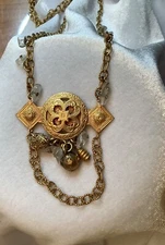 kirk's Folly goldtone necklace with crystals and charms