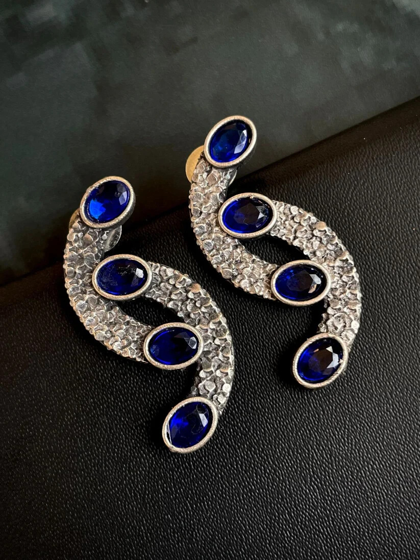 Sparkling rhinestone elegant curved silver tone dangle earrings