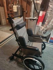 Athena Recliner Wheelchair with Padded Armrests  Adjustable Footrests