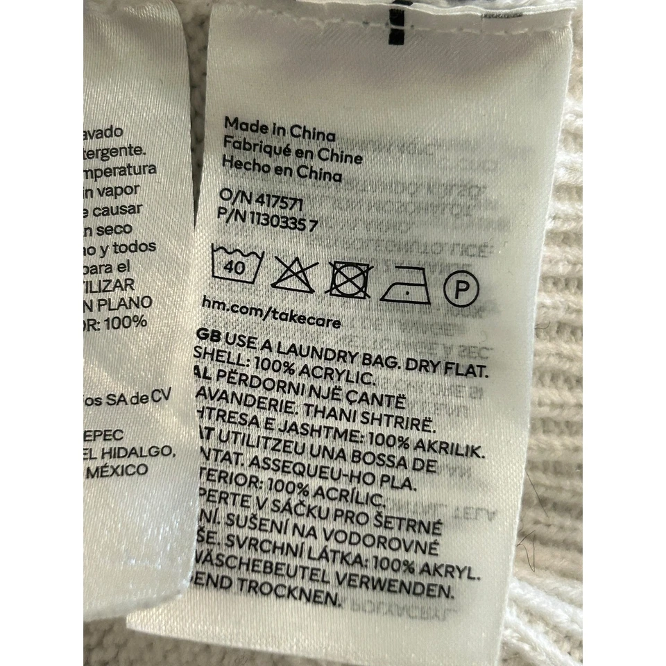 Suéter corto tejido onda geométrica H&M para mujer crema negro manga globo XL Foto 4 de 4