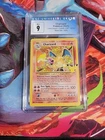 Charizard 4/102 Celebrations Classic Collection Base Set Holo CGC 9