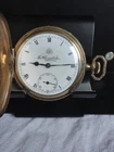 An antique  Swiss made Thomas Russell & son gold plated full hunter pocket watch