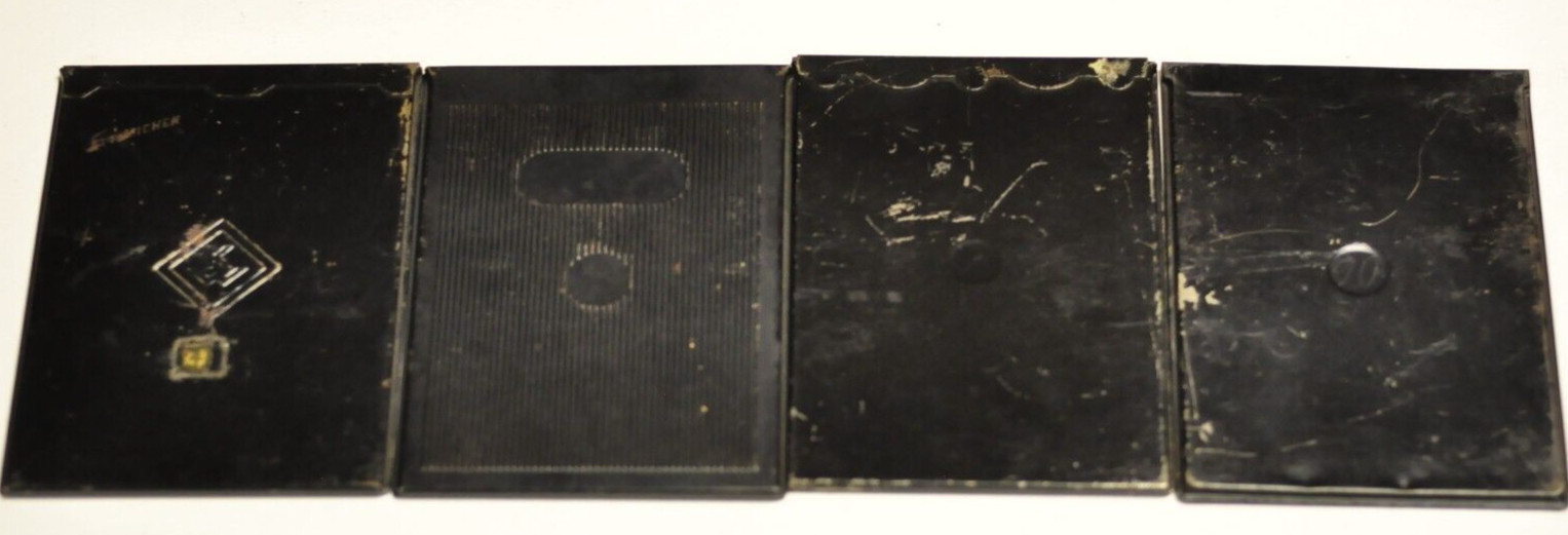 4 metal sheet film holders as shown.