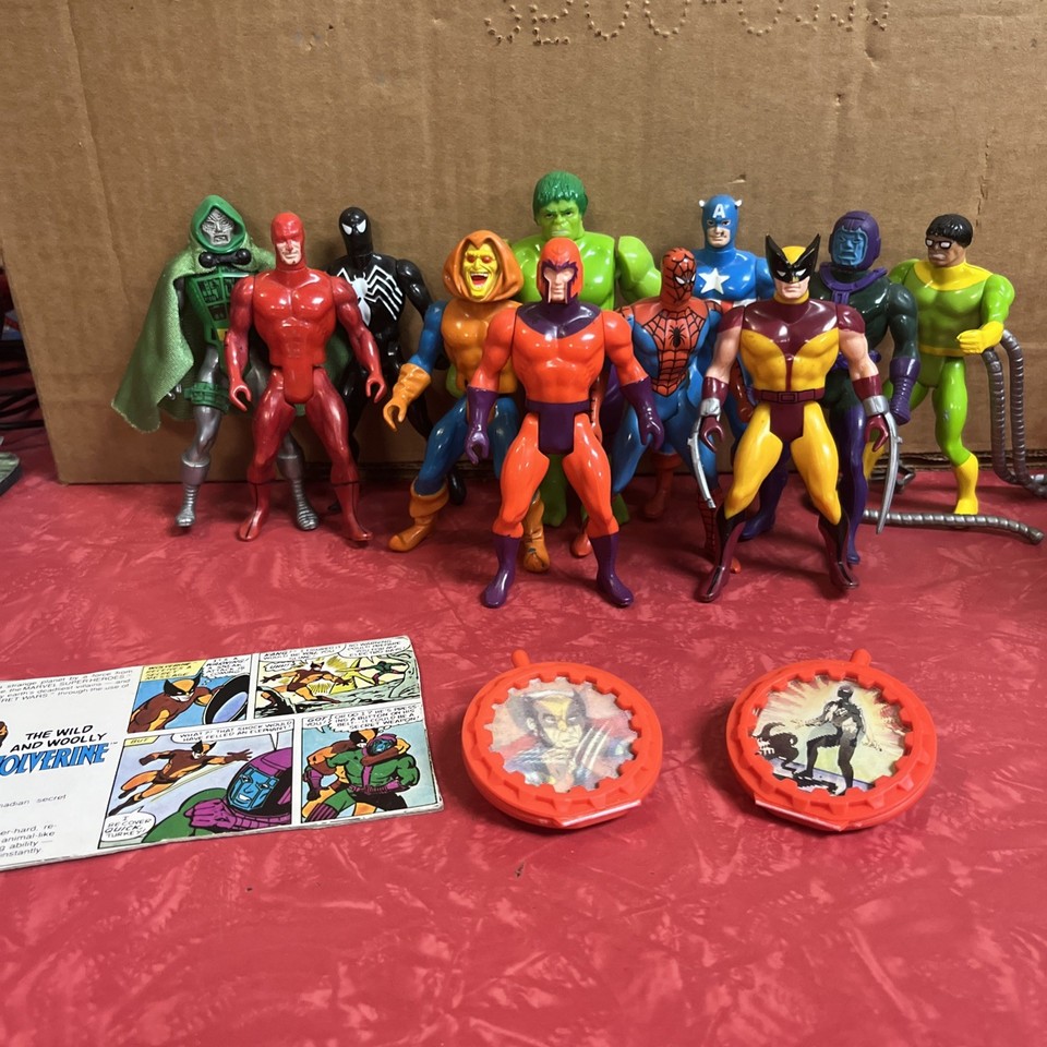 Original 1984-85 Mattel Secret Wars figures including Iron Man, Wolverine, and Dr. Doom — a genuine childhood time capsule for the Marvel collector who was there.