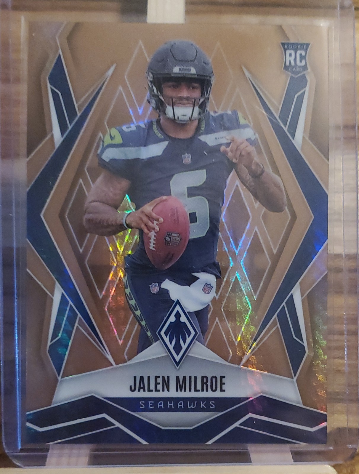 2025 Panini Phoenix - Rookies Jalen Milroe #151 Bronze Hyper /50 (RC)