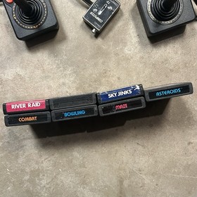 Atari 2600 Console With 2 Joysicks with 7 classic Games Tested & Working Great. 