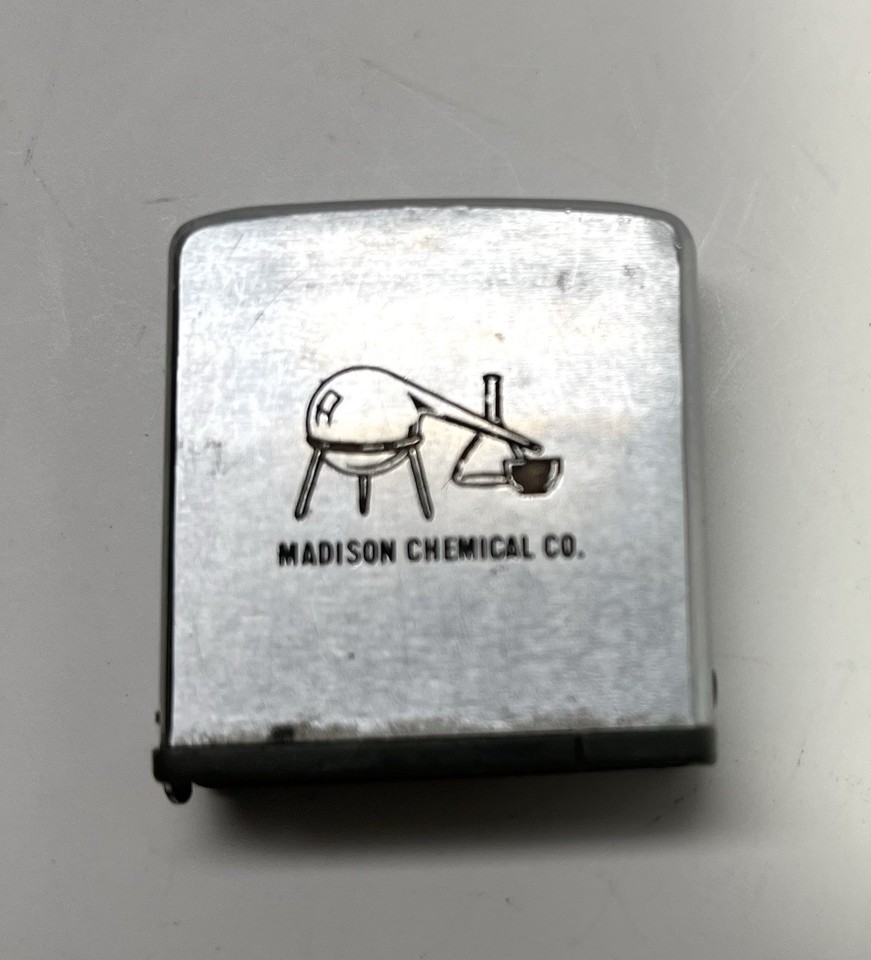 A vintage Zippo-branded tape measure with Madison Chemical Co. advertising — tiny, beautifully made, and a double hit of mid-century Americana nostalgia.