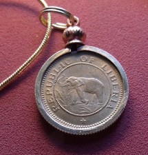 1937 African Elephant Palm Tree Pendant  on an 18k