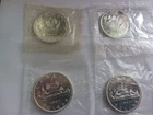 4 Canada Silver Dollar Lot in Cello