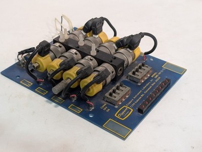 Clippard EMC-08 8-station pneumatic manifold w/ 8 ETO-3M 12VDC valves as shown