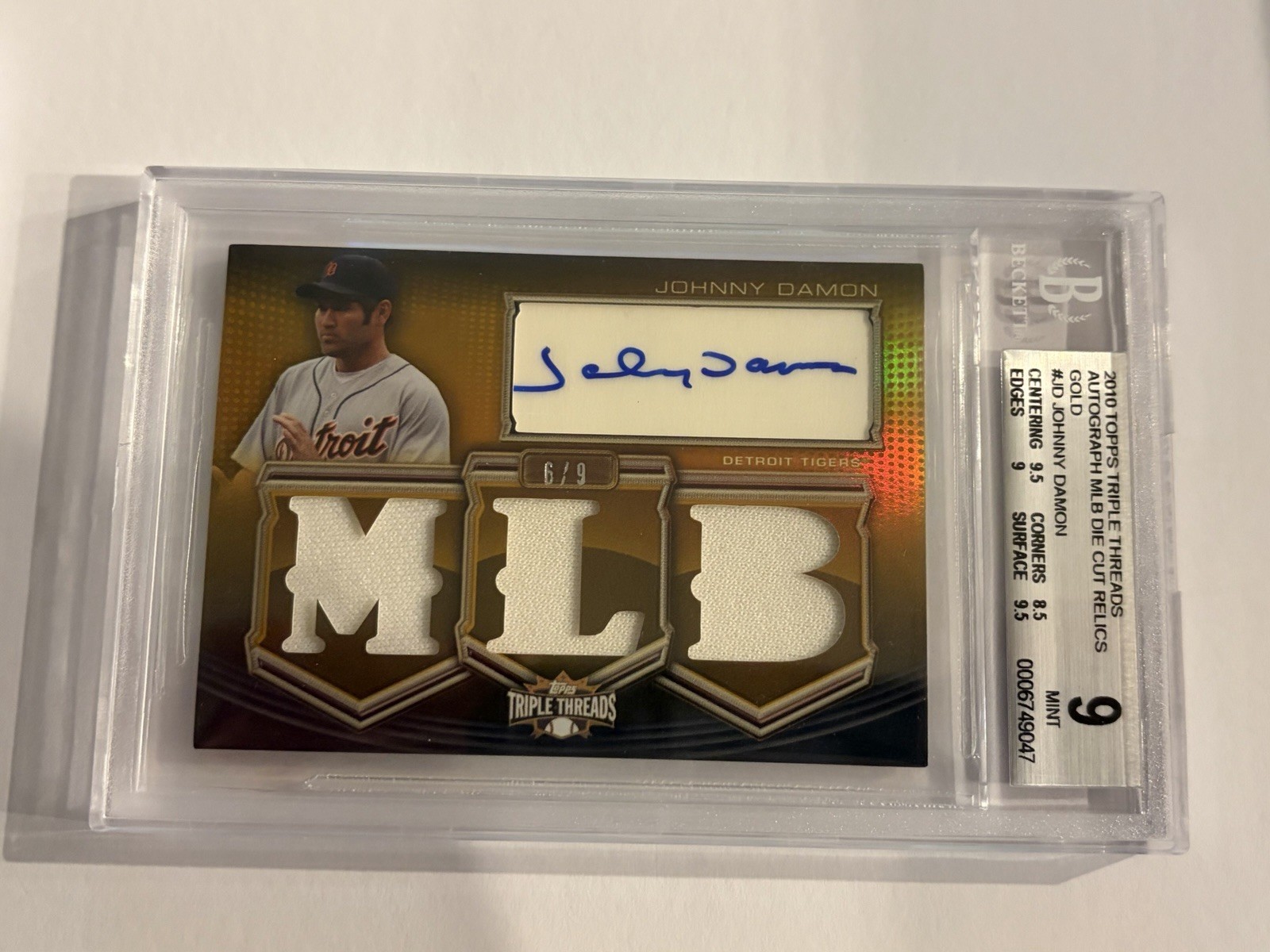 2010 Topps Triple Threads - Autographed Die-Cut Relics Johnny Damon  /9