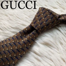 Very popular GUCCI tie all over highest quality silk GG mark brown