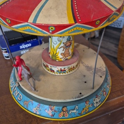 UNIQUE ART  KIDDY GO ROUND  CAROUSEL  WIND UP C. 1950'S Horse Figure Red yellow