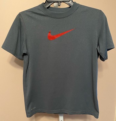 gray and red nike shirt