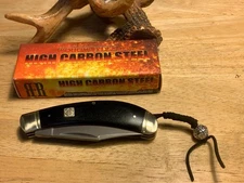 Rough Ryder Black G10 Titanium Coated High Carbon Bow Trapper 4" RR1572
