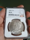 1885 O $1 MS62 Silver Morgan Dollar. Reverse Has Purple Eclipse Toning Starting