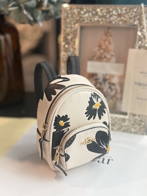COACH リボン柄リュック NWT COACH BLACK/WHITE LEATHER FLORAL MINI COURT BACKPACK BAG CHARM