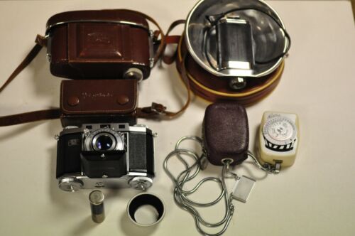 Zeiss Ikon Contina II 524/24 folding 35mm camera w/45mm Novar lens & accessories - Afbeelding 1 van 11