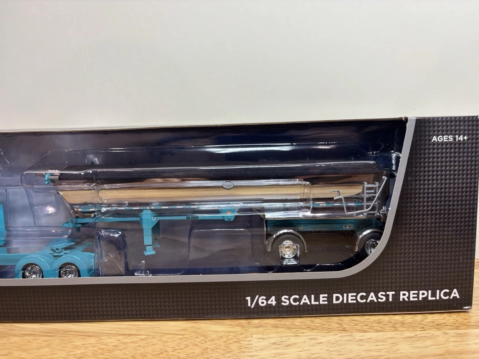 DCP 1/64 Kenworth W900L & MAC Dump Trailer Turquoise/Chrome - Image 4 of 4