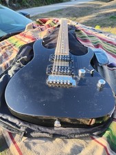 Ibanez serie GIO GS160906476 con estuche de guitarra aún cubierto con película de plástico